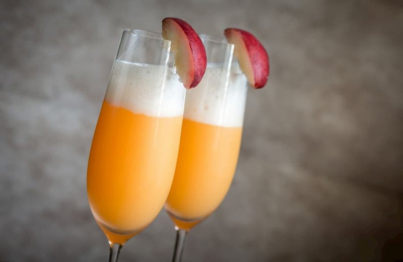 For this recipe, use Prosecco or any dry sparkling wine and combine it with peach puree to make a Bellini instead of Mimosa.