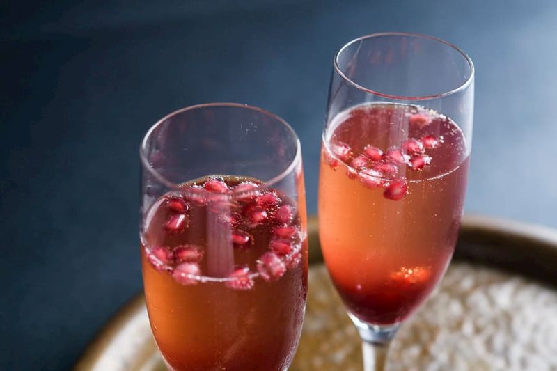 Replace the orange juice in a classic mimosa recipe with pomegranate juice for a Pomegranate Mimosa.