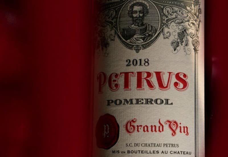 The 2018 Petrus Merlot wine has a dark and intense fruit flavor of black cherry and cassis.