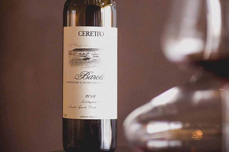 Ceretto Barolo wine bottle and glass