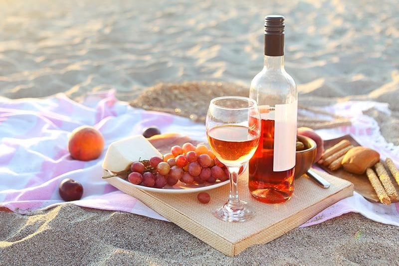 Pinot Noir Rose with food on beach