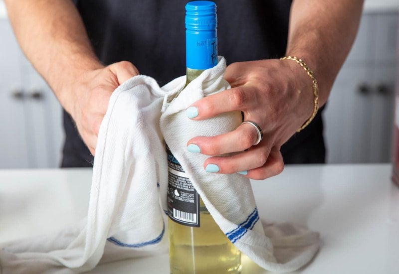 How To Open A Wine Bottle : The Tapping Method