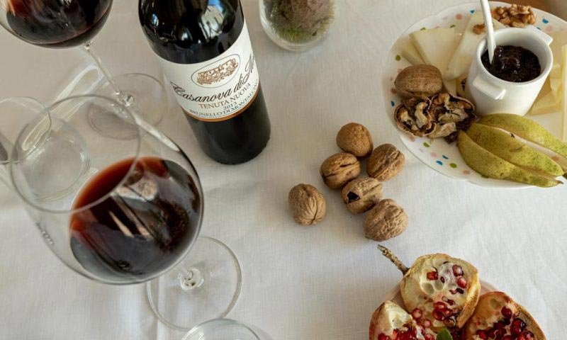 Bottle of Casanova di Neri wine with snacks