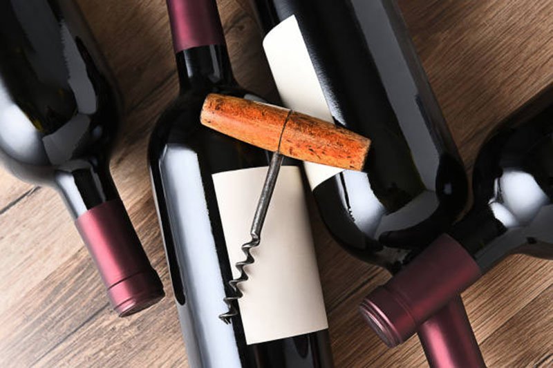 Claret Wine and corkscrew

