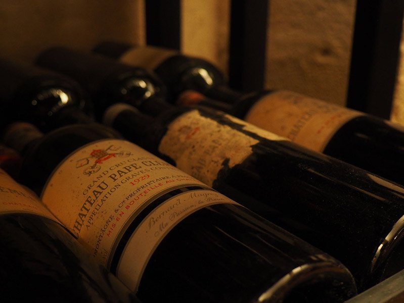 Bottles of Chateau Pape Clement of the Pessac Leognan appellation.