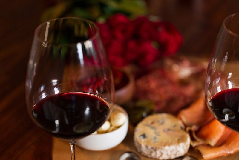Pinot Noir pairs with a variety of foods because it has low tannin levels and higher acidity.
