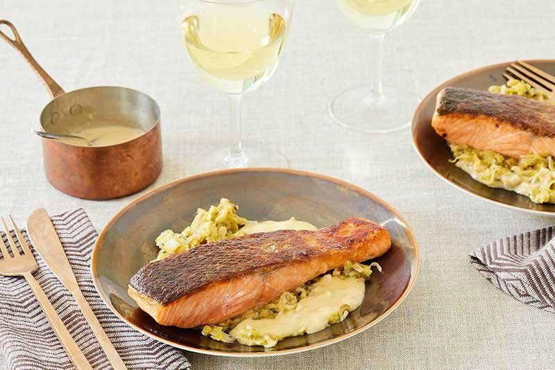 White wine paired with crispy salmon dinner.